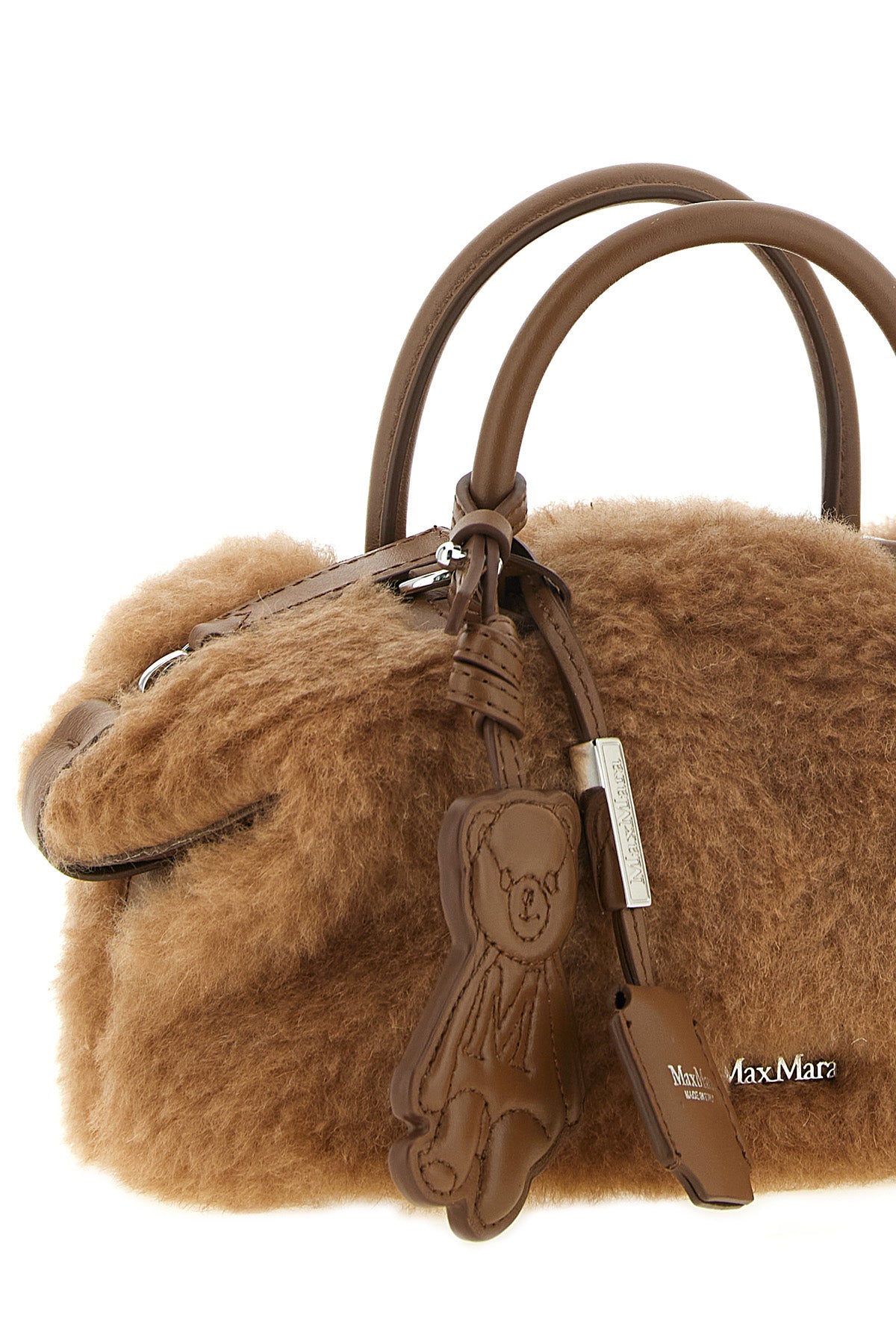 the max mara teddy holdals small handbag stands out for its iconic and volumin