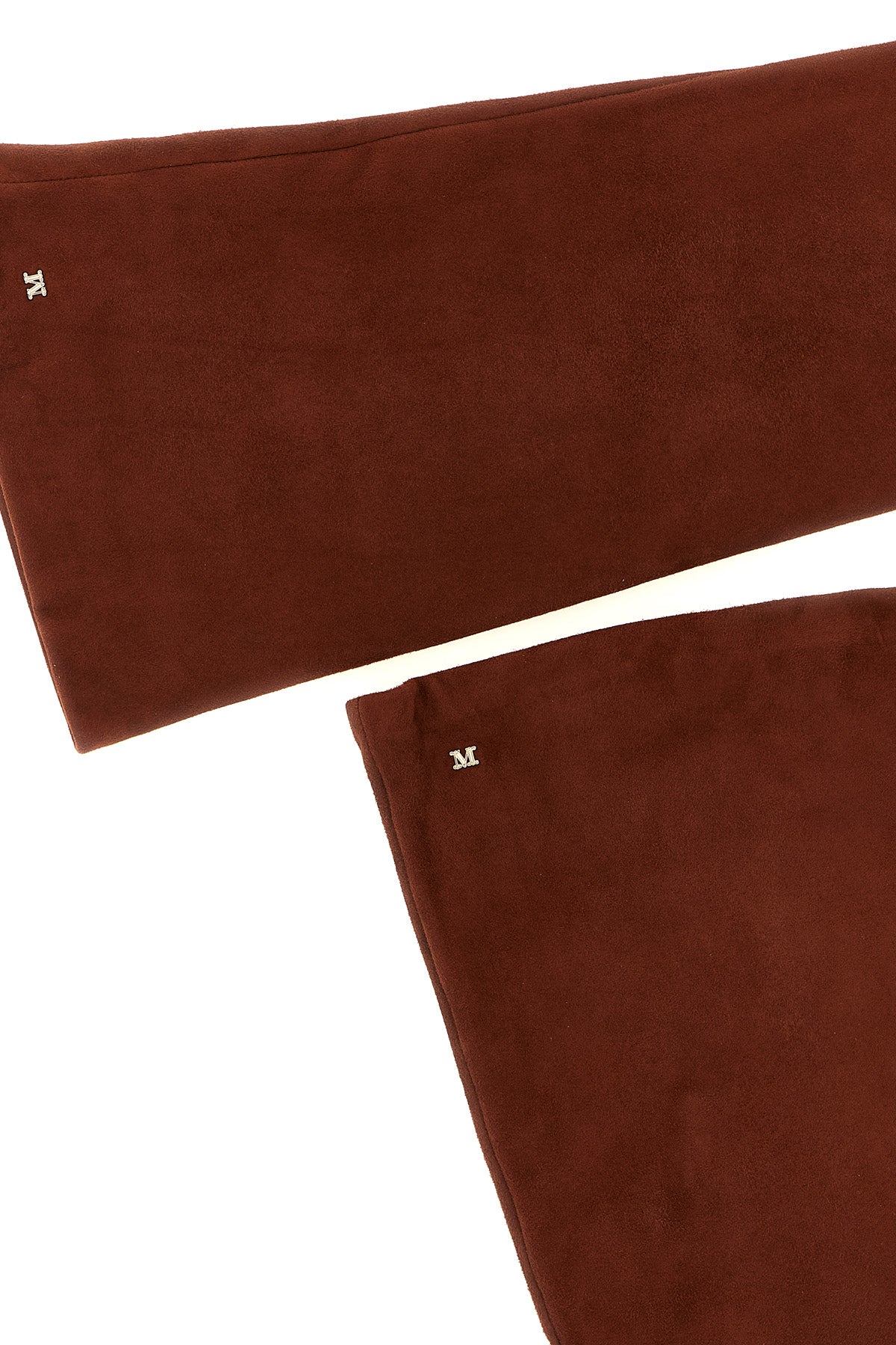 max mara estremo long gloves redefine winter elegance through bold proportions