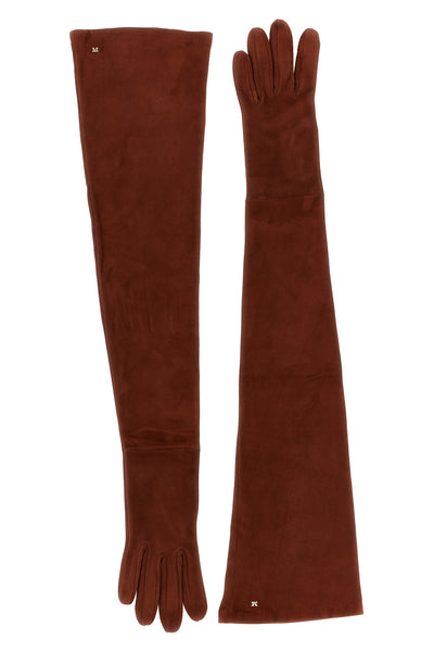 max mara estremo long gloves redefine winter elegance through bold proportions