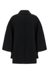the max mara mxaospite unlined hood redefines the volumes of the outerwear thr