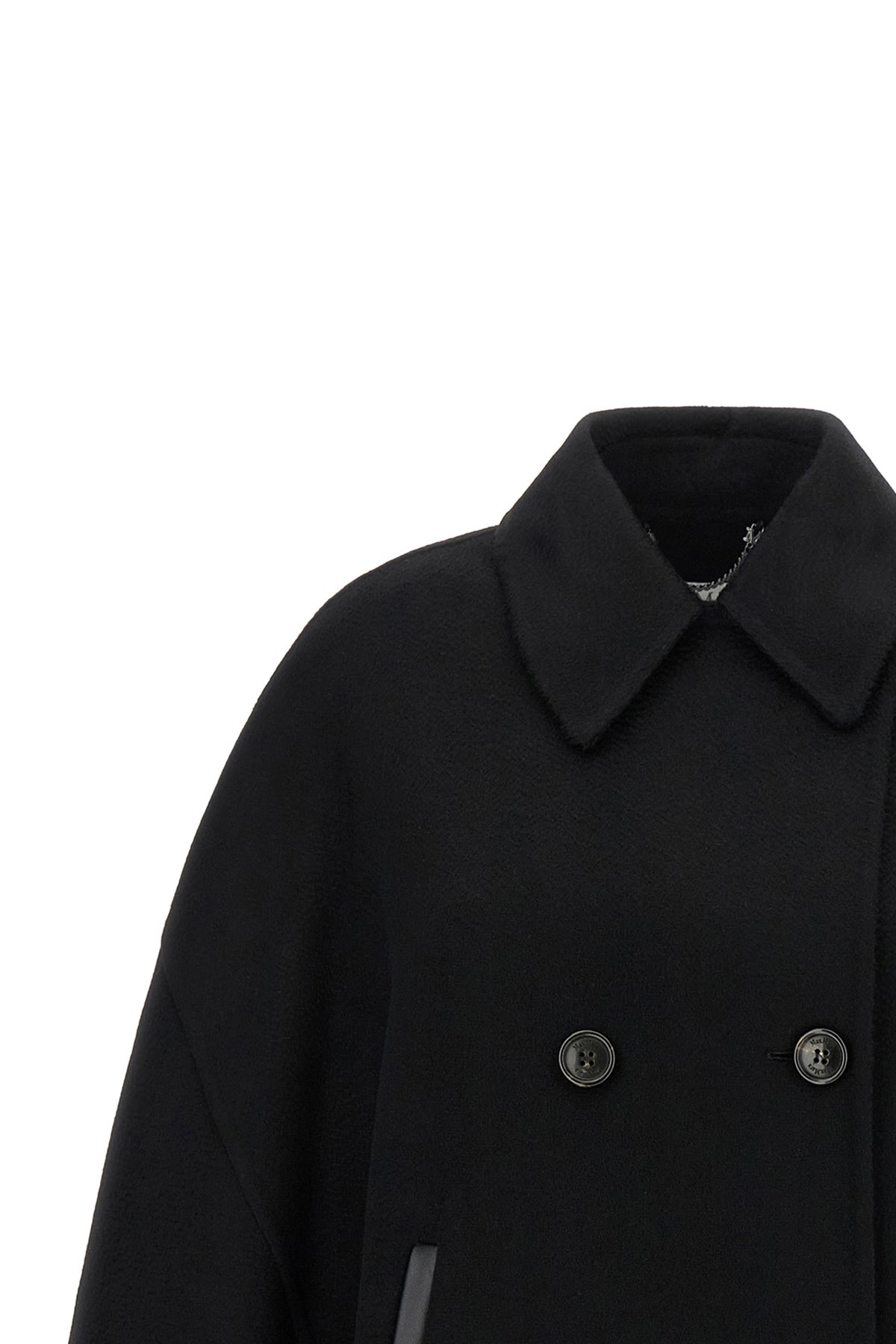 the max mara mxaospite unlined hood redefines the volumes of the outerwear thr