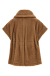 the max mara new abavo cape redefines the codes of the outerwear through a str