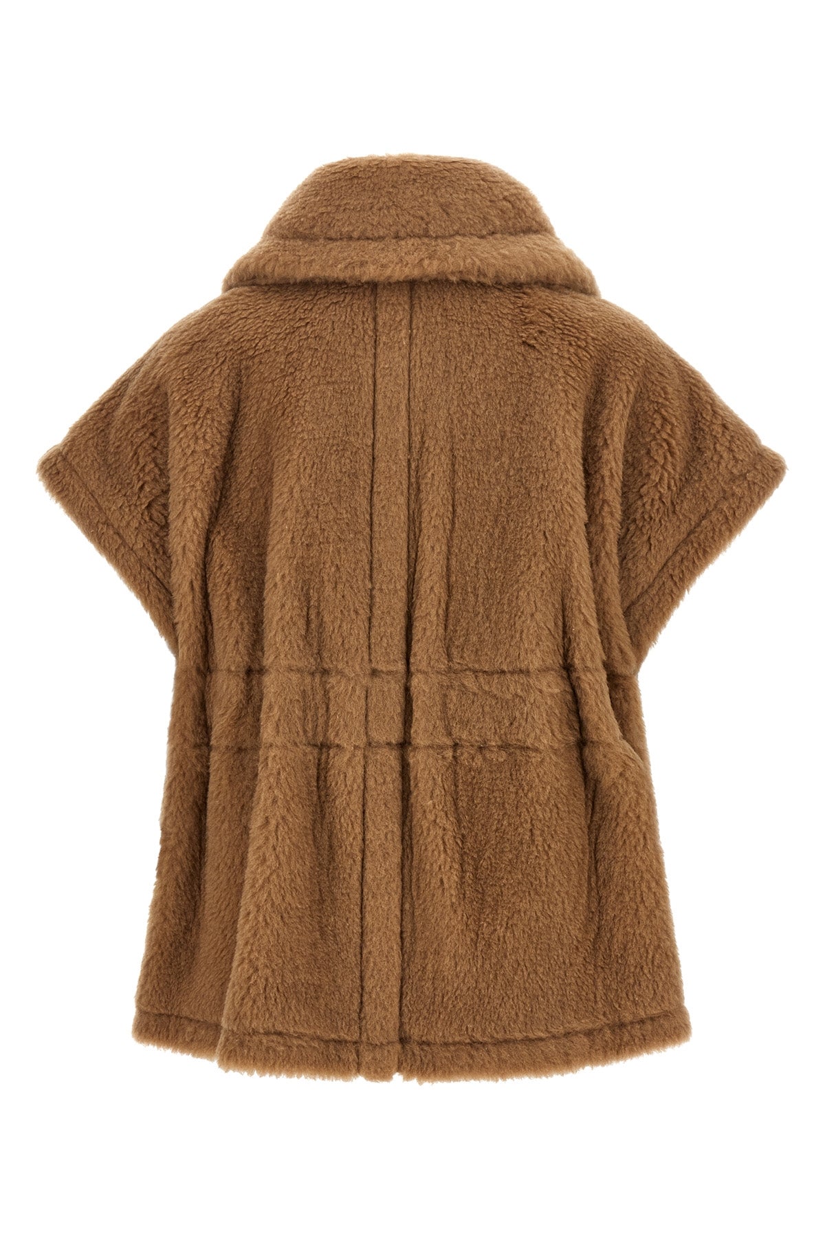 the max mara new abavo cape redefines the codes of the outerwear through a str