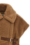 the max mara new abavo cape redefines the codes of the outerwear through a str