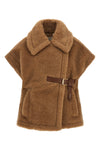 the max mara new abavo cape redefines the codes of the outerwear through a str