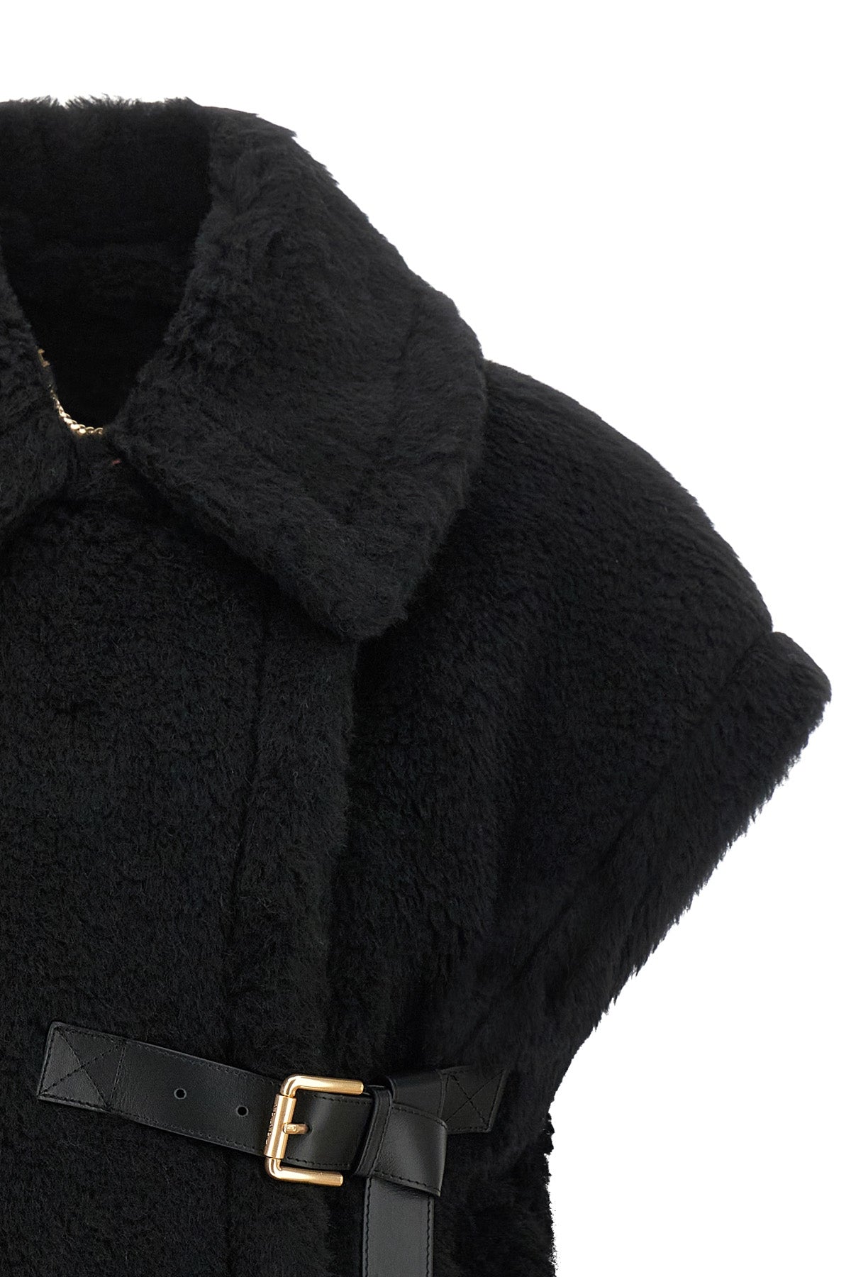 the max mara new abavo cape redefines the volumes of outerwear through a sleev