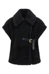the max mara new abavo cape redefines the volumes of outerwear through a sleev