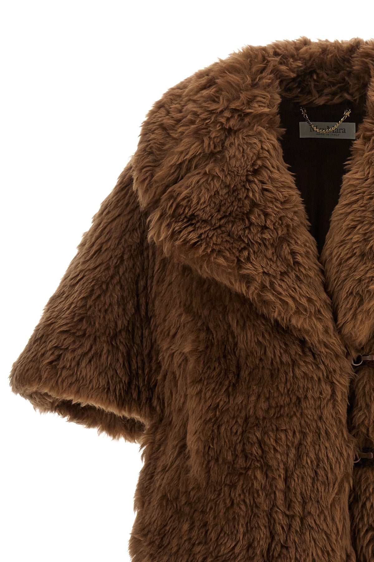 the max mara accorta hood is distinguished by a voluminous construction in pur