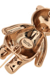 the max mara brooch in the shape of a bear defines a precious aesthetic through