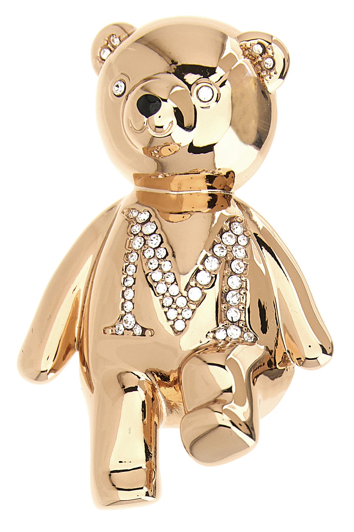 the max mara brooch in the shape of a bear defines a precious aesthetic through