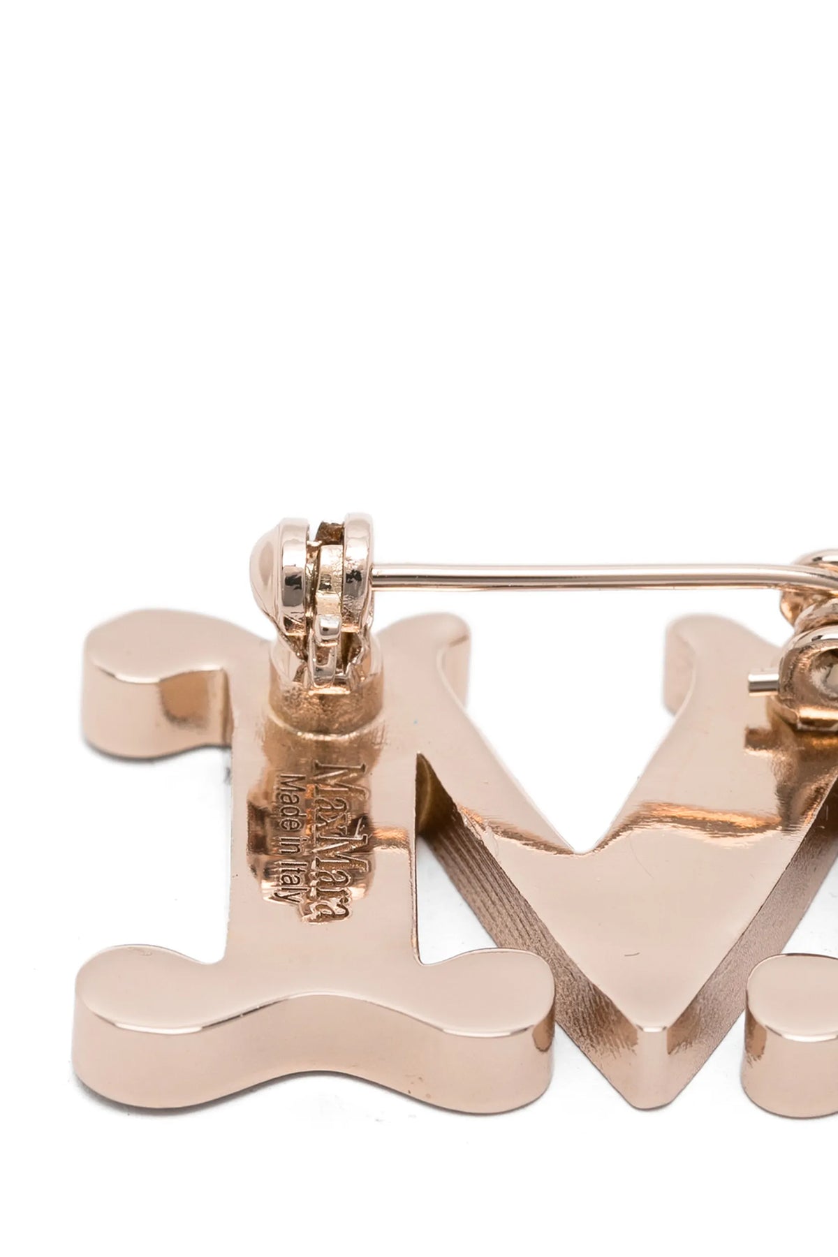 the max mara facella brooch embodies the essence of contemporary luxury throug