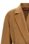 the max mara studio giambo coat redefines luxury outerwear through an envelopi