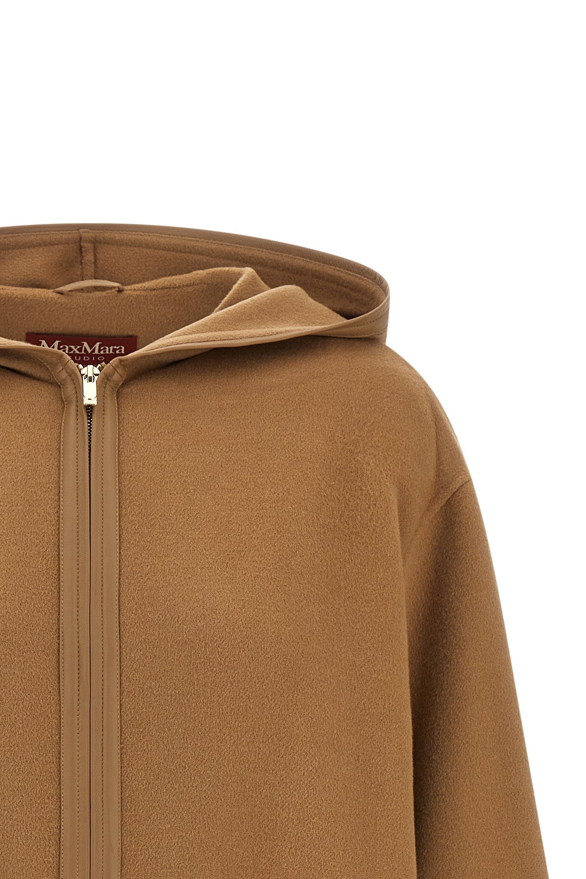 the max mara studio jacket redefines everyday outerwear through a relaxed silhou