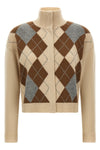the slightly cropped max mara studio pacche cardigan exemplifies luxury knitwe