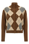 the slightly cropped max mara studio pacche cardigan redefines luxury knitwear