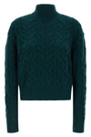 max mara studio cosmo knitwear redefines winter knitwear through complex braid