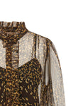 the twinset shirt is distinguished by a fluid silhouette made of semi-transparen