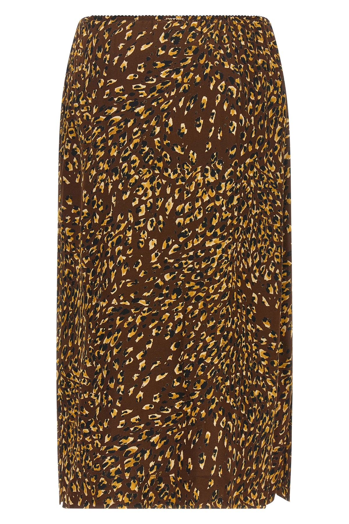 the twinset midi skirt redefines everyday aesthetics through a fluid silhouette