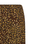 the twinset midi skirt redefines everyday aesthetics through a fluid silhouette
