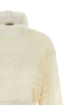 the maxi twinset knit redefines the codes of knitwear through a relaxed silhouet