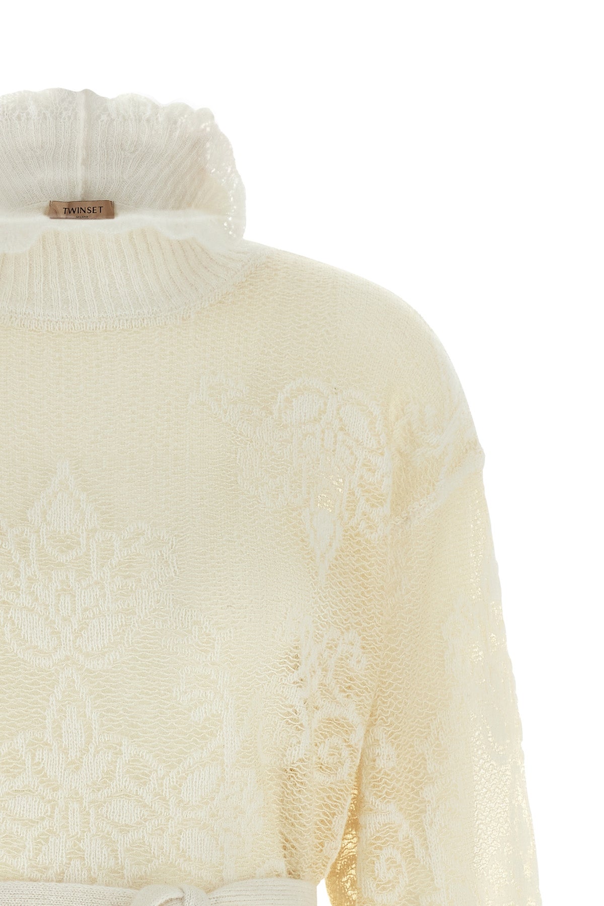 the maxi twinset knit redefines the codes of knitwear through a relaxed silhouet