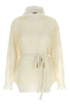 the maxi twinset knit redefines the codes of knitwear through a relaxed silhouet