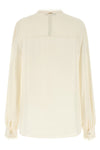 the twinset shirt redefines the codes of everyday elegance through an impeccable