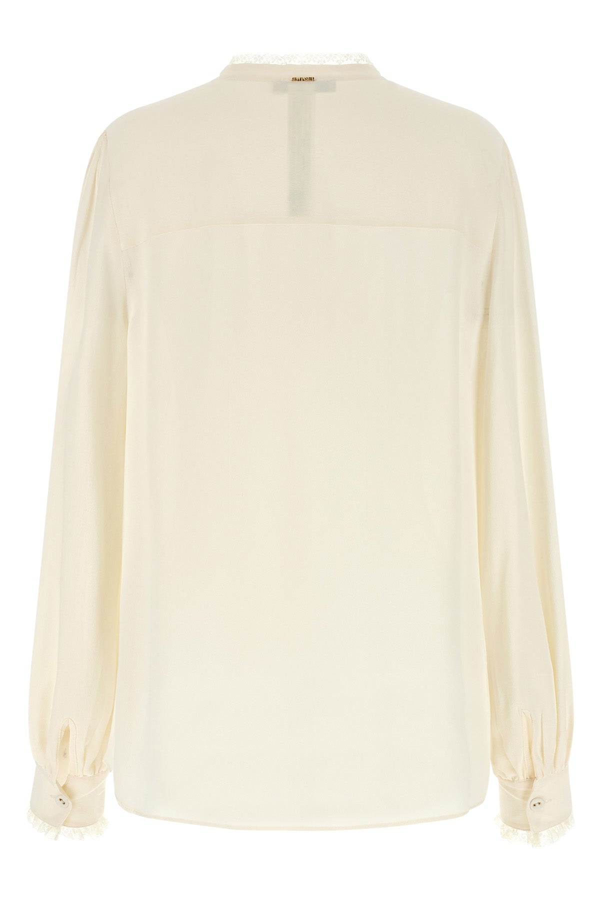 the twinset shirt redefines the codes of everyday elegance through an impeccable