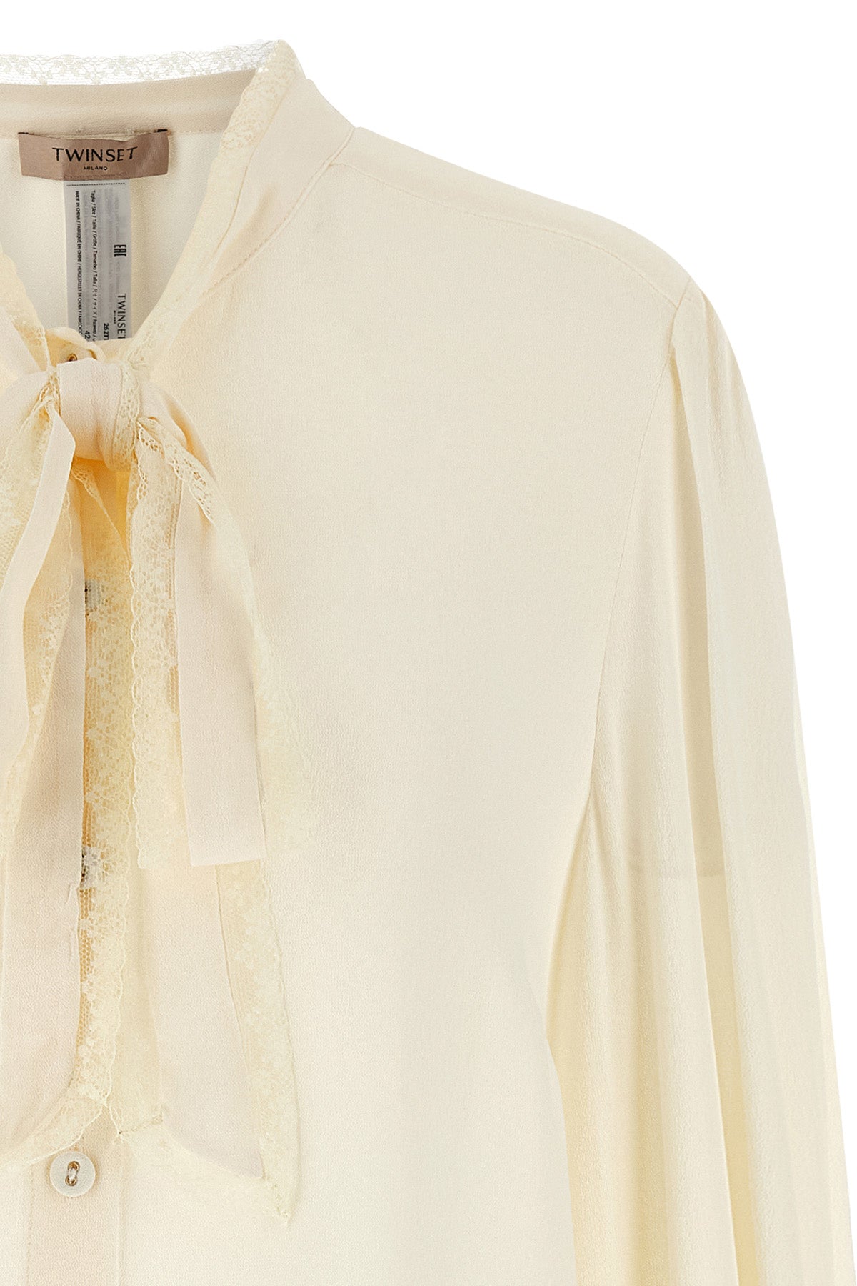 the twinset shirt redefines the codes of everyday elegance through an impeccable