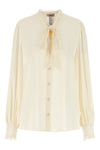 the twinset shirt redefines the codes of everyday elegance through an impeccable