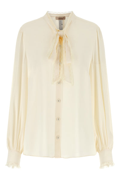 the twinset shirt redefines the codes of everyday elegance through an impeccable