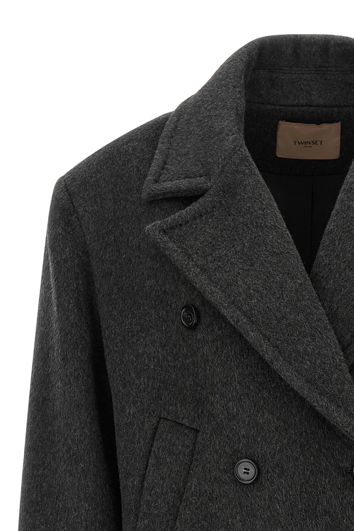 the twinset caban redefines the codes of outerwear through relaxed volumes and s