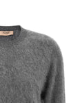 the twinset crew neck sweater redefines essential knitwear through meticulous ma