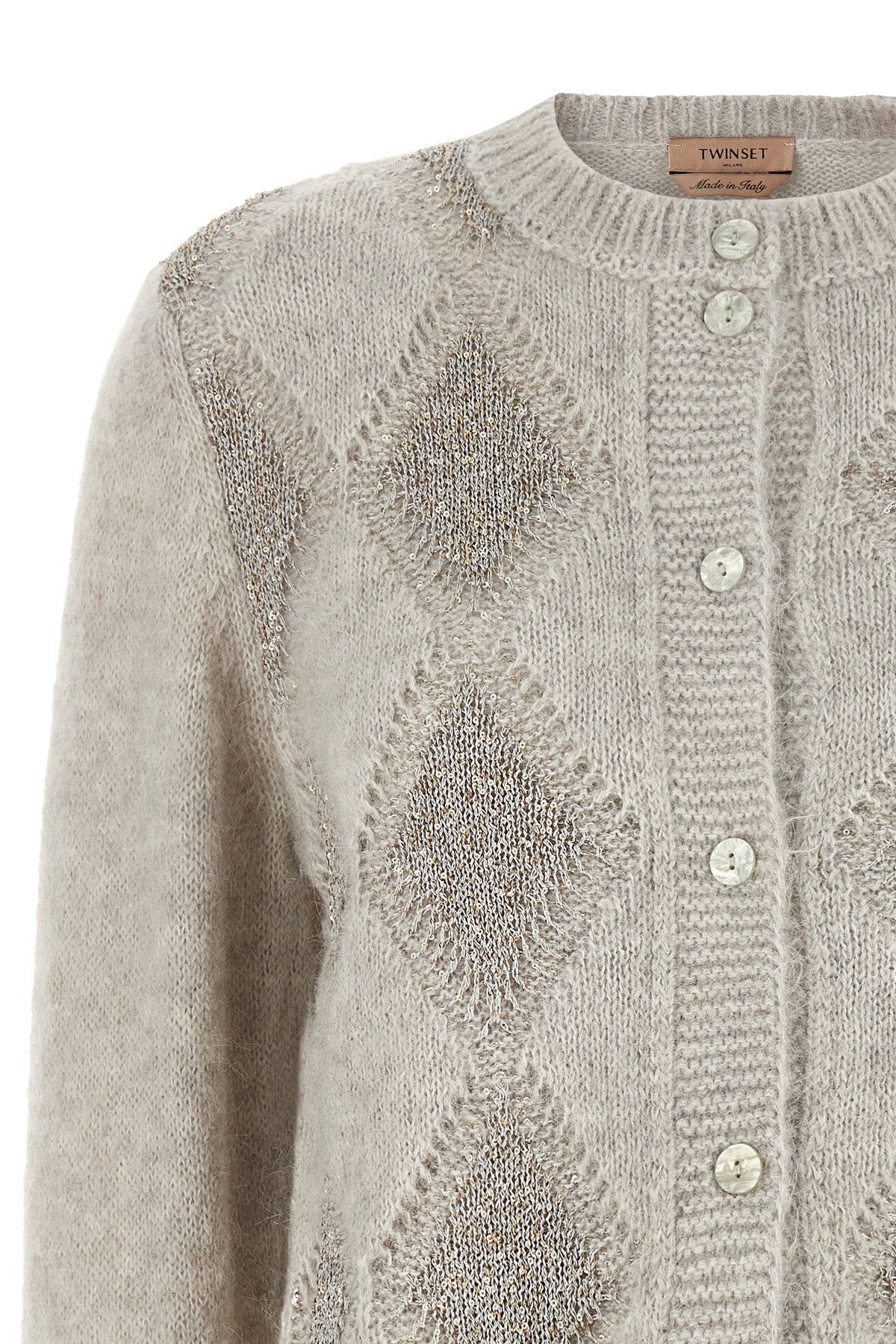 the twinset cardigan stands out for its sartorial construction in a fine alpaca