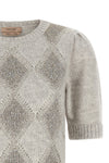 the twinset short-sleeved sweater reinterprets classic knitwear through a precio