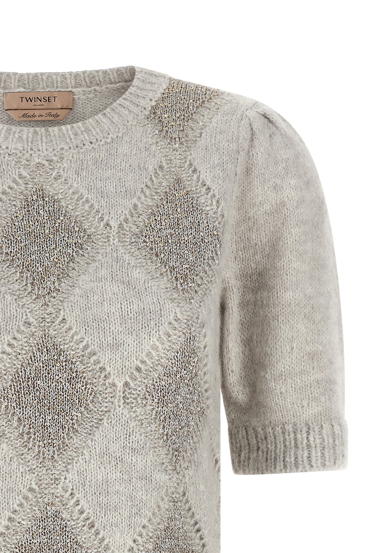 the twinset short-sleeved sweater reinterprets classic knitwear through a precio