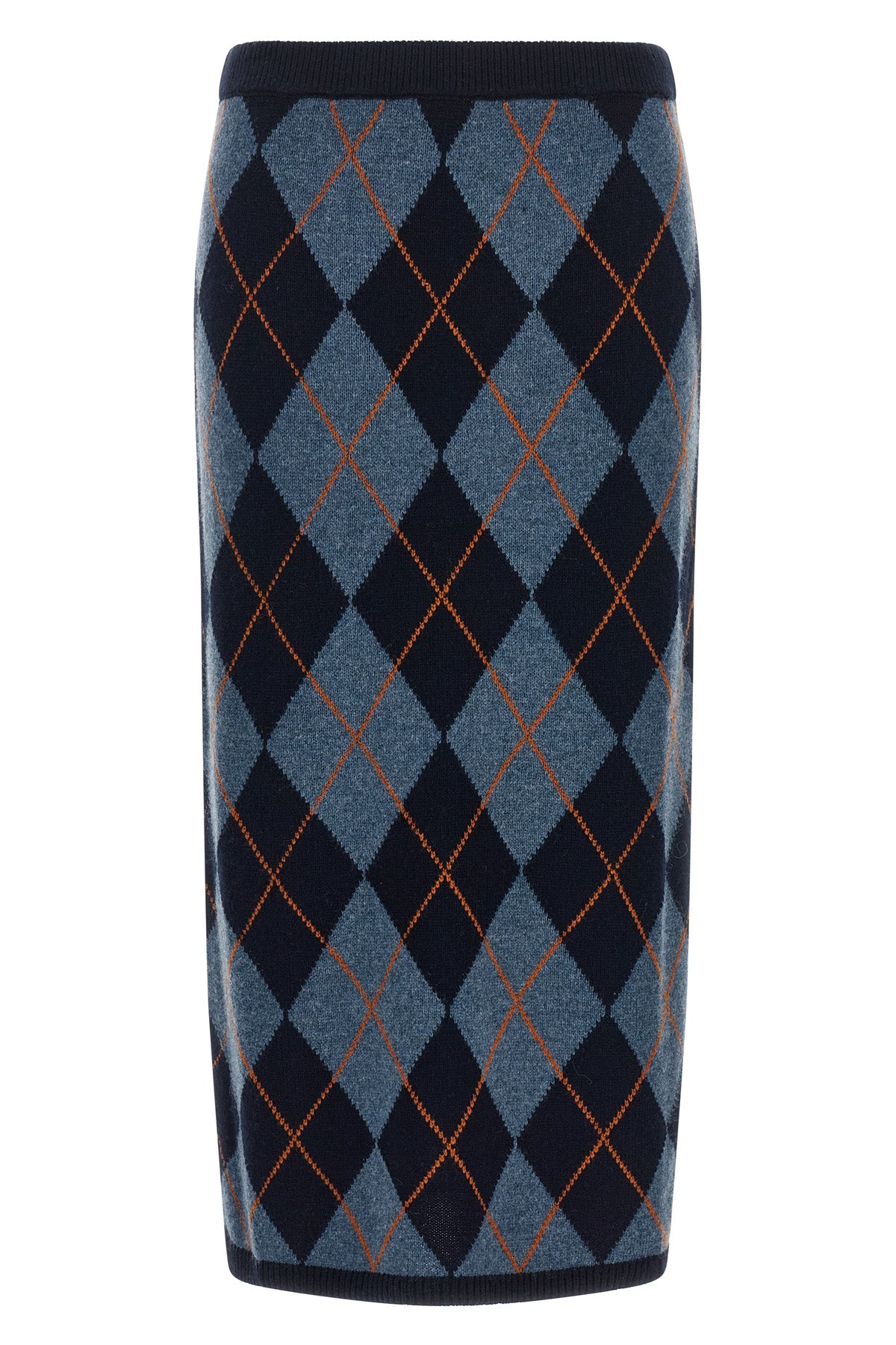 the longuette skirt twinset redefines the codes of classic knitwear through a ti