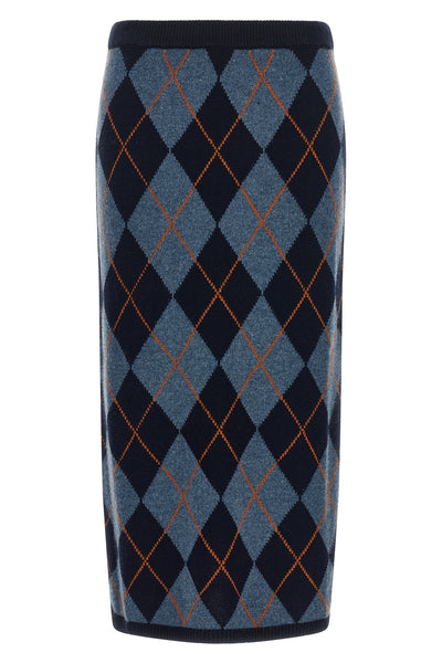 the longuette skirt twinset redefines the codes of classic knitwear through a ti