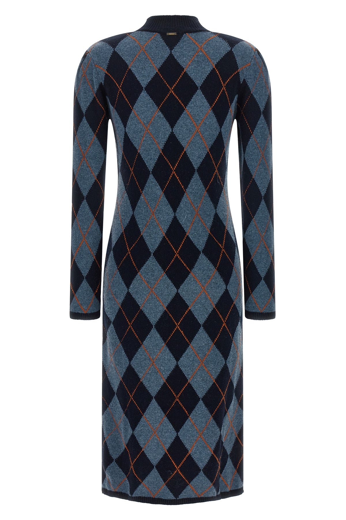 the knitted dress twinset redefines everyday elegance through a tight and struct
