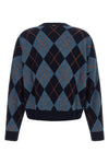 the twinset crewneck sweater redefines classic knitwear through a silhouette