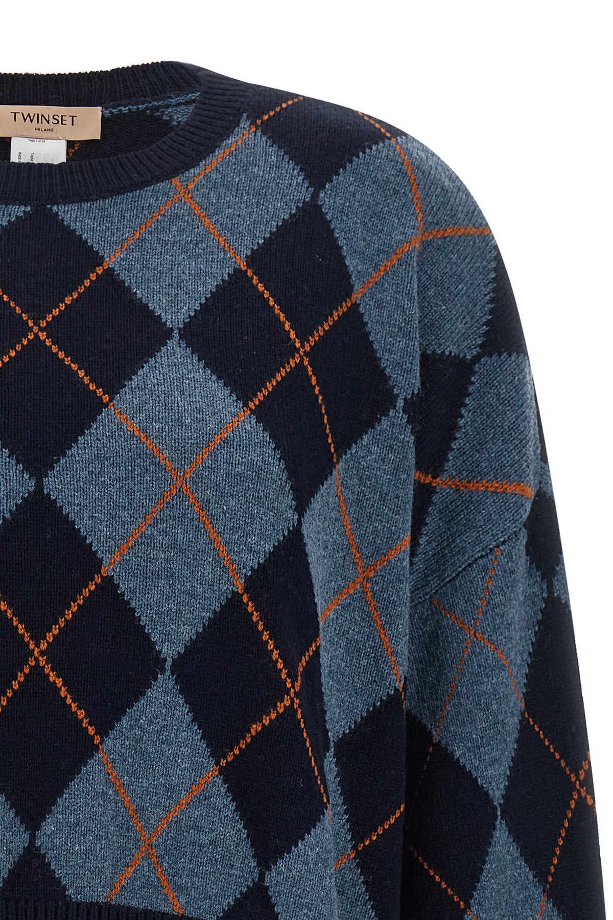 the twinset crewneck sweater redefines classic knitwear through a silhouette
