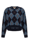 the twinset crewneck sweater redefines classic knitwear through a silhouette