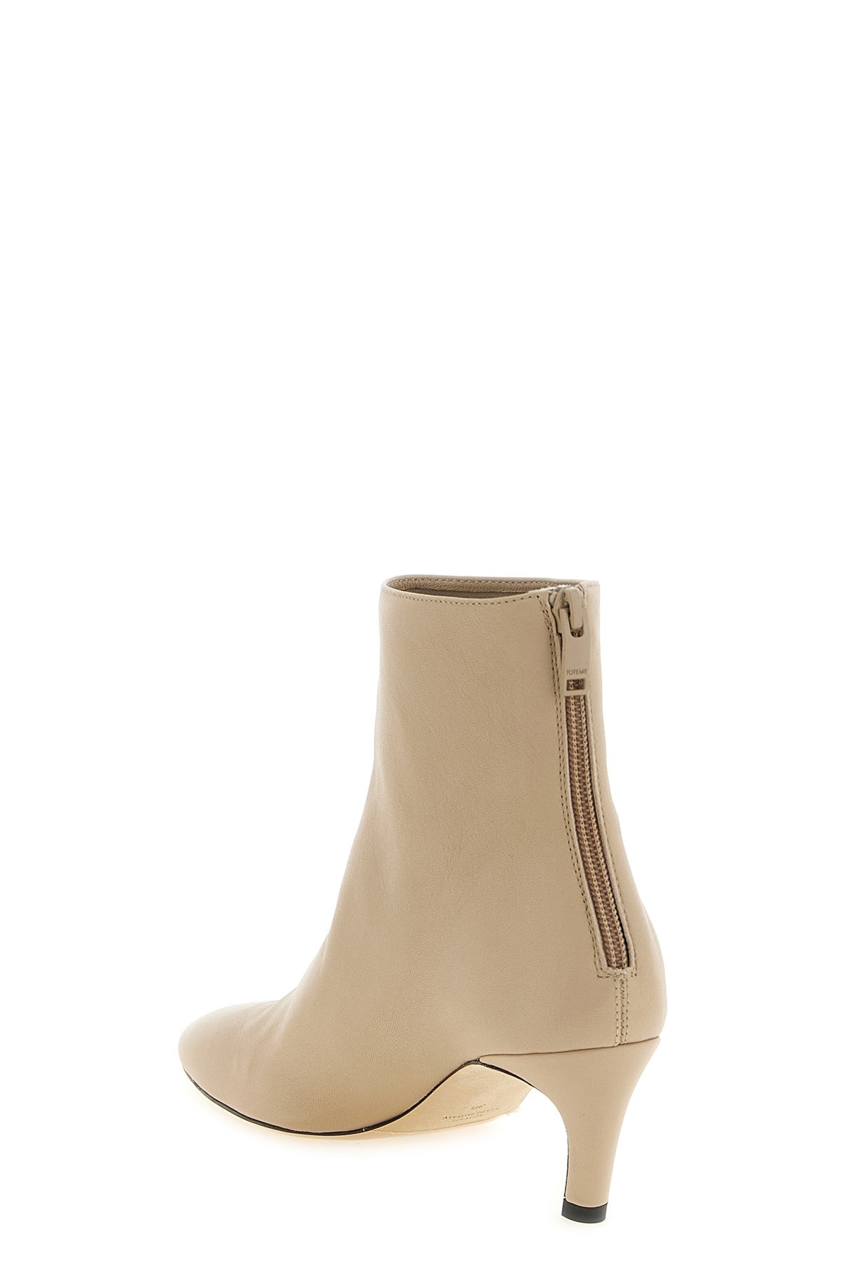 the toteme ankle boots redefines everyday elegance through an essential and enve