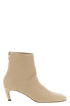 the toteme ankle boots redefines everyday elegance through an essential and enve
