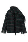 the toteme jacket redefines the codes of outerwear through a relaxed silhouette