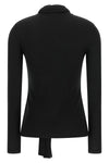 the toteme cardigan redefines everyday elegance through an essential silhouette