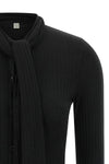 the toteme cardigan redefines everyday elegance through an essential silhouette