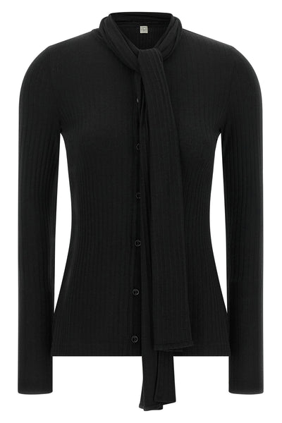 the toteme cardigan redefines everyday elegance through an essential silhouette