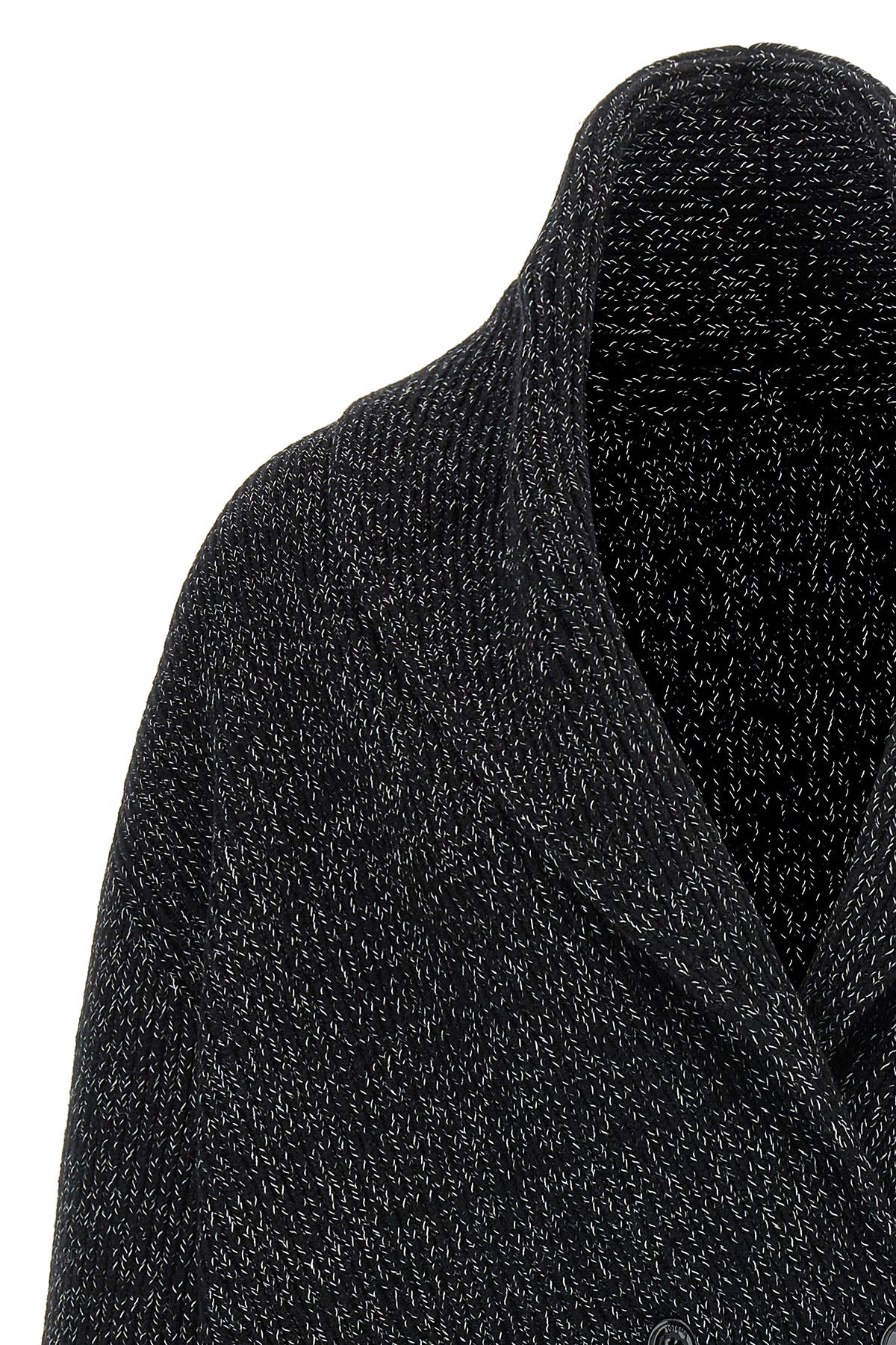 the toteme cardigan redefines the volumes of knitwear through a sculptural and e