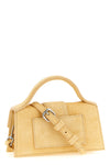 the jacquemus le bambino handbag defines a structured trapezoidal silhouette